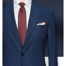 Costume Bleu faux-uni — détail tissu et finition sur mesure