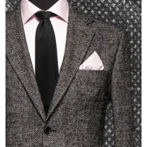 Costume Gris Caviar — détail tissu et finition sur mesure