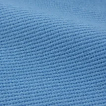 Smoking mariage bleu méditerranéen — détail macro tissu
