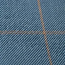 Veste bleu clair double carreaux marron — détail macro tissu