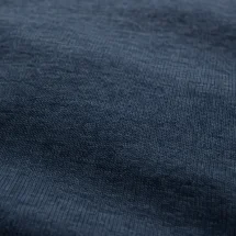 Pull polo manche courte bleu indigo — détail macro tissu