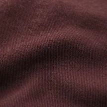 Pull polo manche courte bordeaux — détail macro tissu
