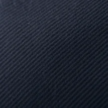 Veste bleu plastron amovible — détail macro tissu