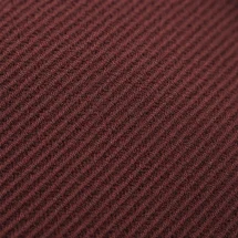 Veste bordeaux plastron amovible — détail macro tissu