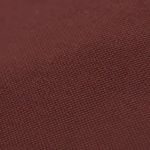 Parka matelassée bordeaux — détail macro tissu