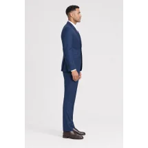 Costume mariage bleu intense — vue profil porté