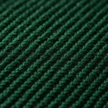 Costume mariage vert sapin — détail macro tissu