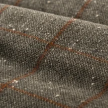 Doudoune grise carreaux marron — détail macro tissu