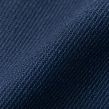 Costume bleu moyen Australis — détail macro tissu