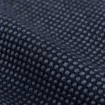 Costume Bleu foncé grain caviar — détail macro tissu