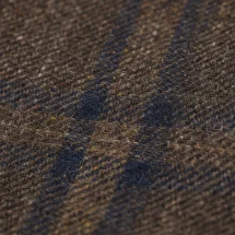 Veste marron carreaux bleu — détail macro tissu