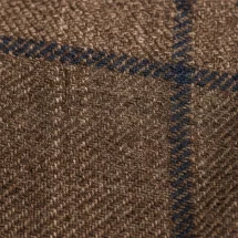 Veste marron carreau bleu — détail macro tissu