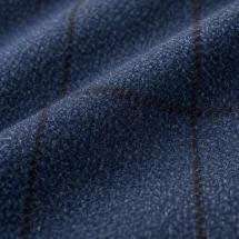 Veste bleu moyen large carreau — détail macro tissu