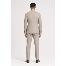 blazer beige — vue de dos porté
