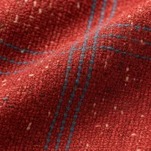 Blazer rouge carreaux bleu — détail macro tissu