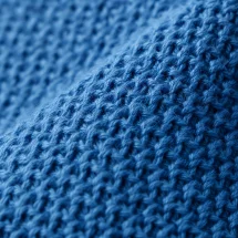 Cravate Tricot Bleu Ciel — détail matière macro