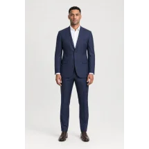 Costume Bleu carreaux foncés — porté face — sur mesure — Costume Privé Paris